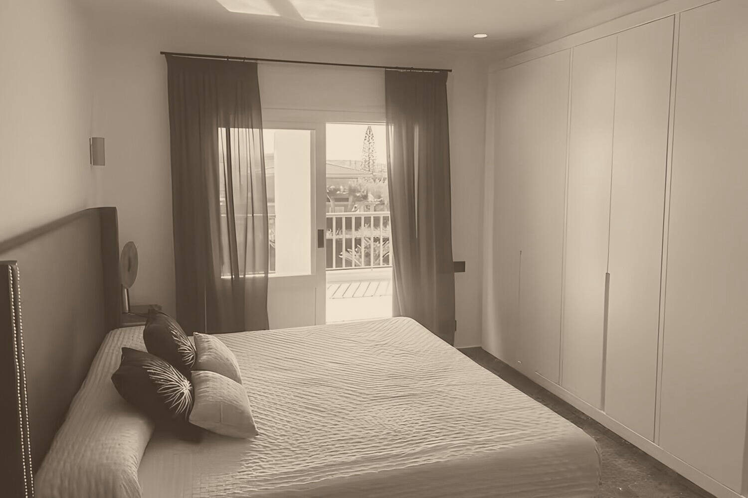 One of the six double bedrooms, opening to a balcony