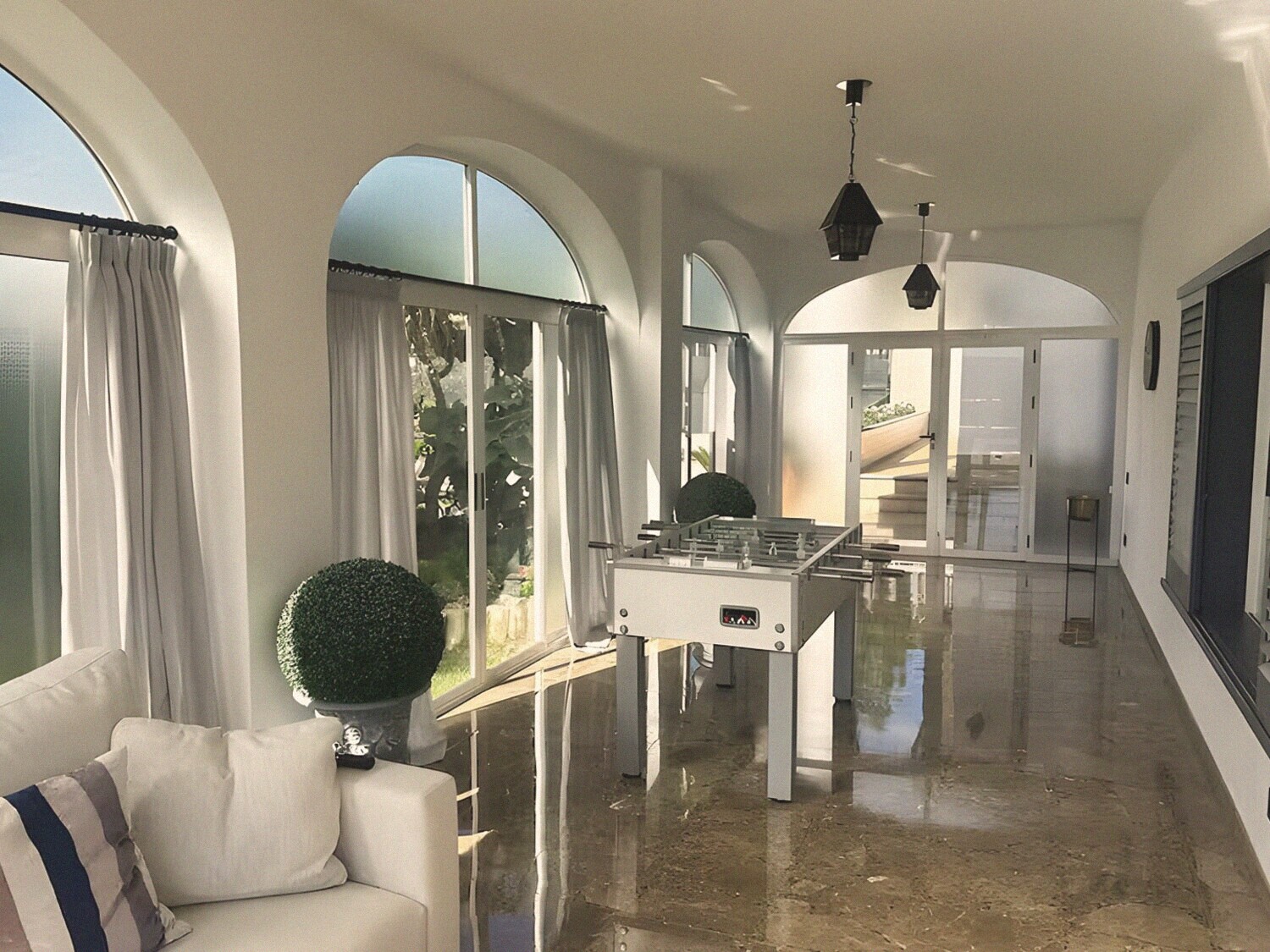 The games room in the arched sunroom